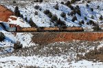 UP 5628, 5663, 8025 (C44ACCTE, C44ACCTE, C45ACCTE) lead an eastbound manifest exiting a small tunnel at Castle Rock, Utah. February 19, 2022 {Winter Echofest}